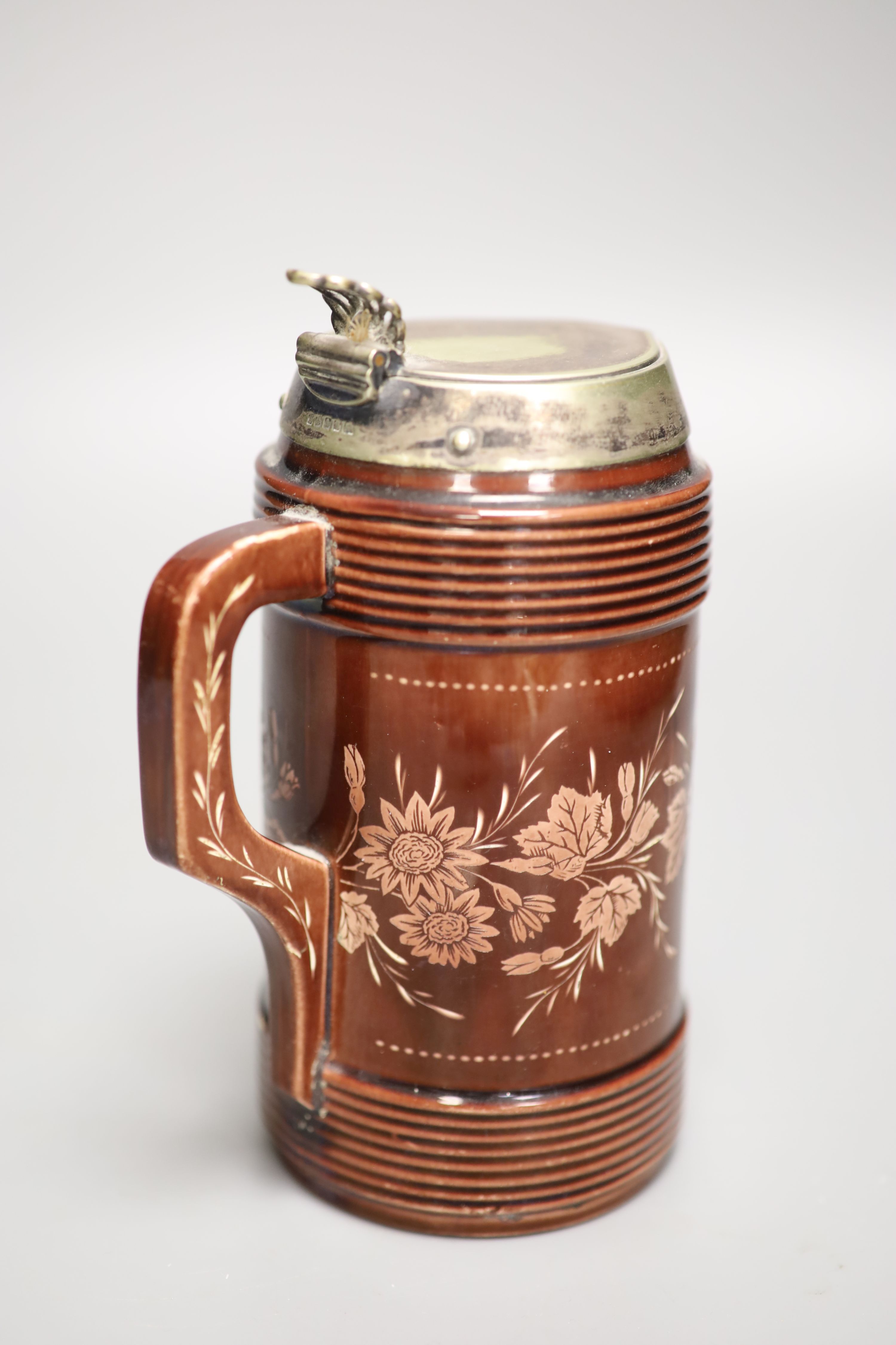 John Northwood (1837-1902) for Wedgwood . A rare wheel engraved brown glazed jug, signed, height 18cm
